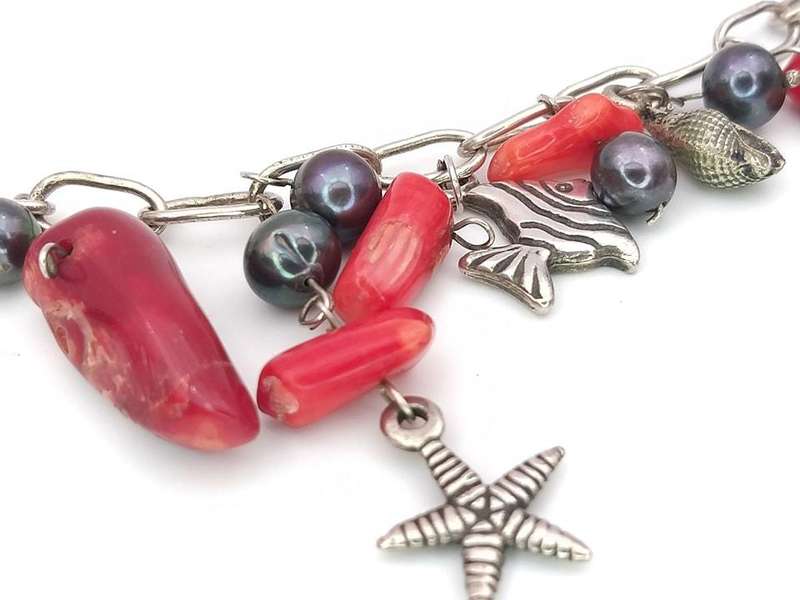 Sterling silver and genuine red coral charm bracelet