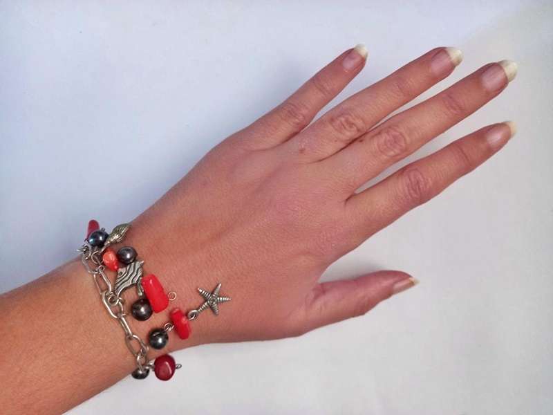 Sterling silver and genuine red coral charm bracelet