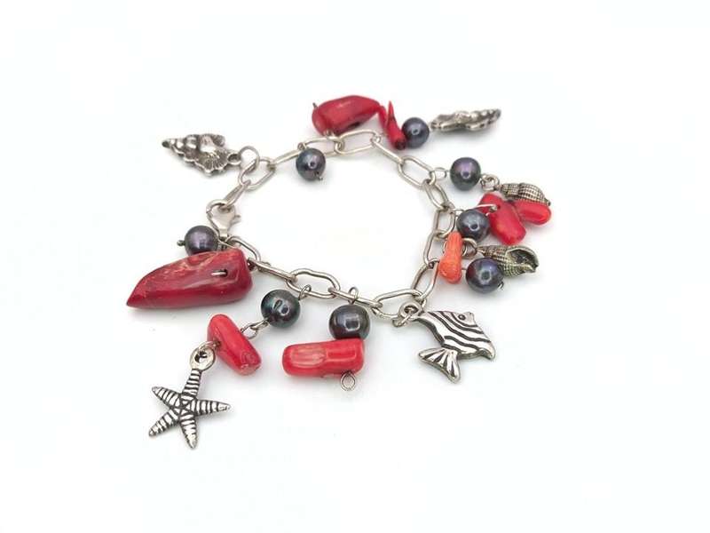 Sterling silver and genuine red coral charm bracelet