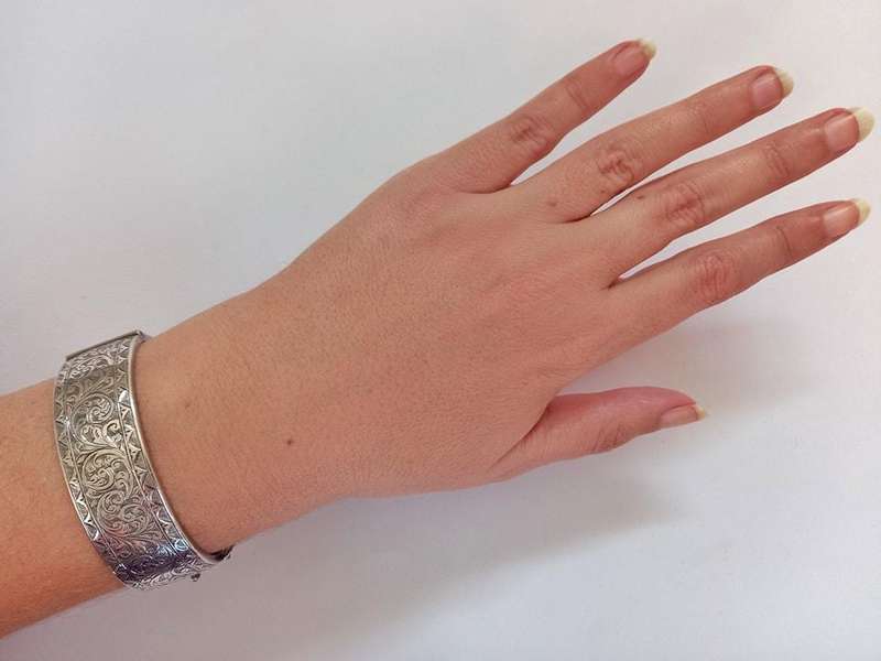 Antique sterling silver hinged bangle