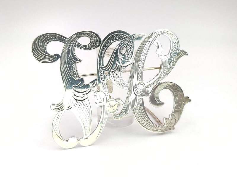 Gorgeous sterling silver scrolled initials brooch