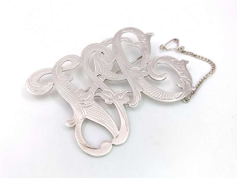 Gorgeous sterling silver scrolled initials brooch