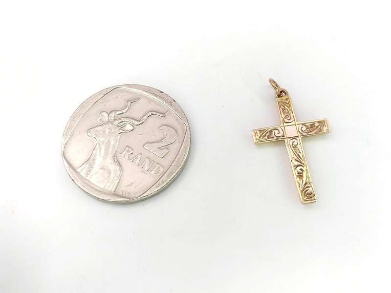 Vintage embossed 9ct gold gold cross pendant