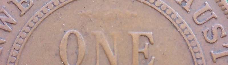 Australia 1919 penny Error.  Nearly completely missing top scroll.