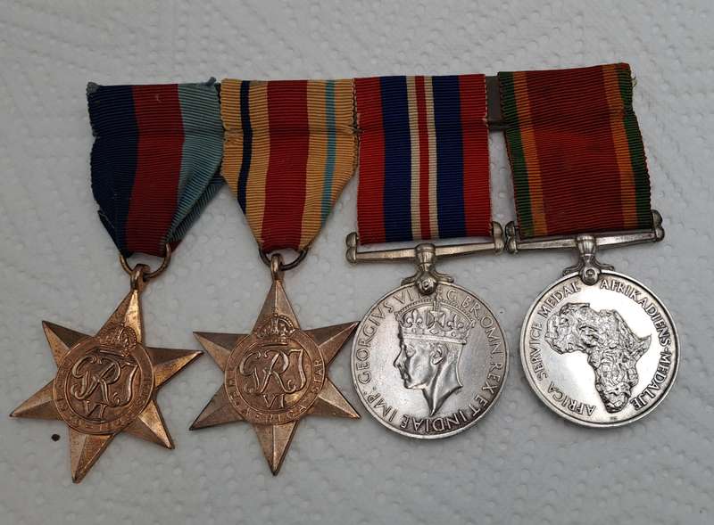 Set of 4 Full Size WW2 (World World 2) Medals Issued to J.L Shoobert Nr.79087