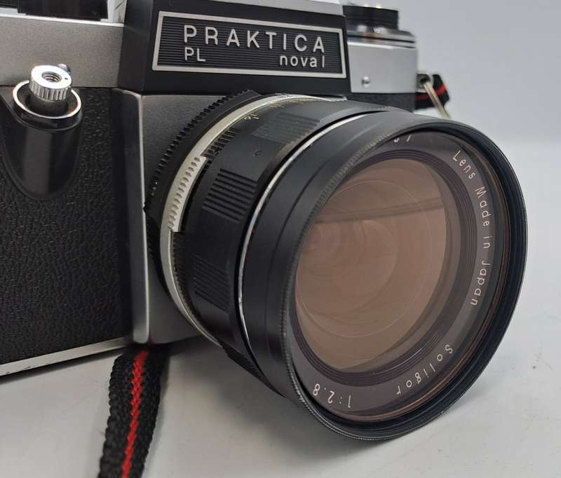 Vintage Praktica PL nova 1 35mm Camera with 1:2.8 F28mm Lens and skilight filter