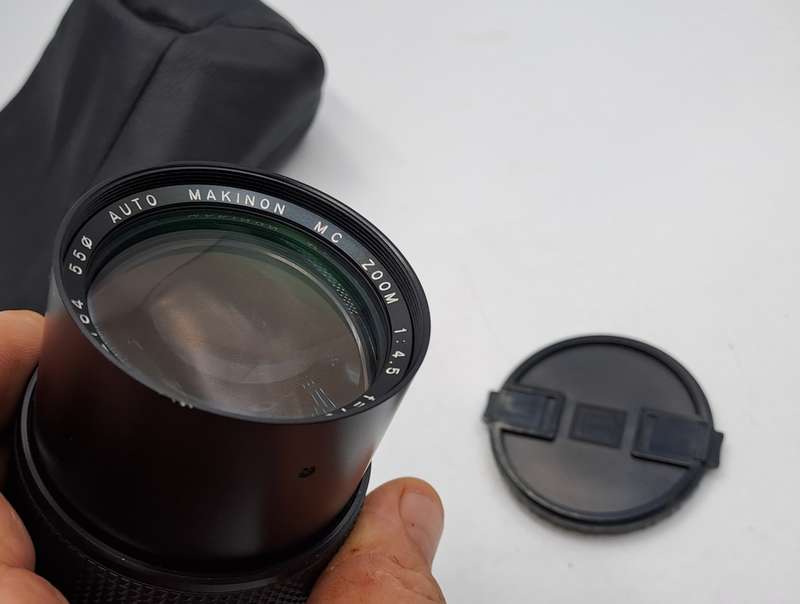 Pre-owned Makinon MC Zoom F70-200m 14,5  - 55mm Auto Focus Lens with bag and caps