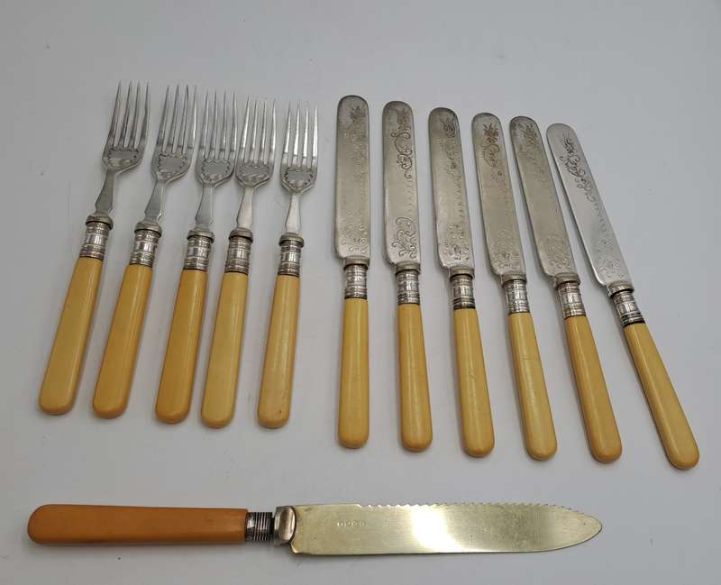 12 Antique Sheffield knifes and forks -The large Knife has hallmark sterling silver Collar