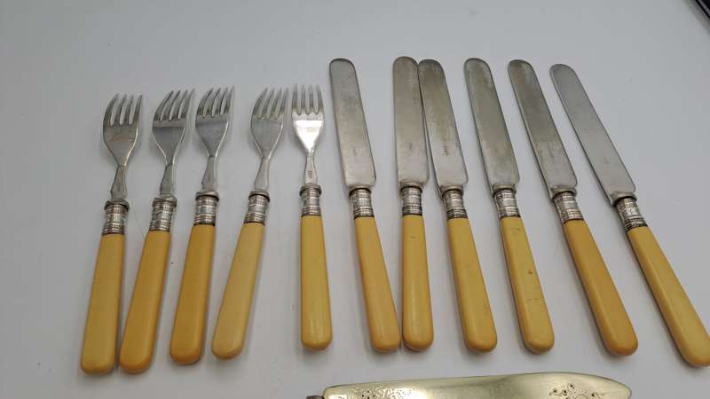 12 Antique Sheffield knifes and forks -The large Knife has hallmark sterling silver Collar