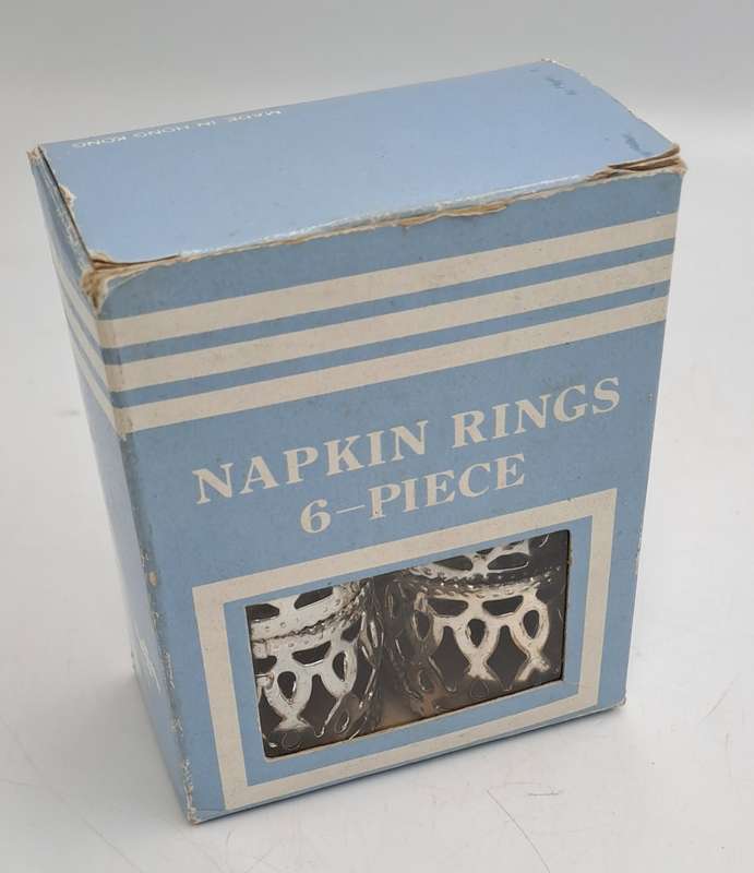 6 Silver plated Napkin rings -Boxed