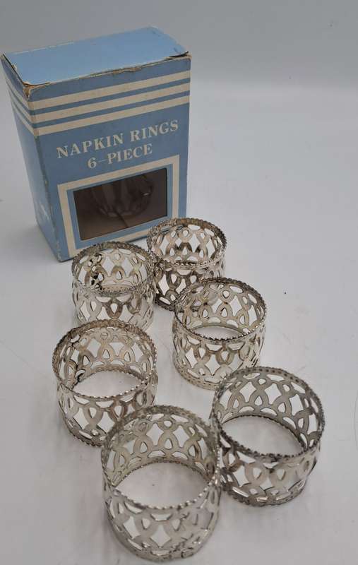 6 Silver plated Napkin rings -Boxed