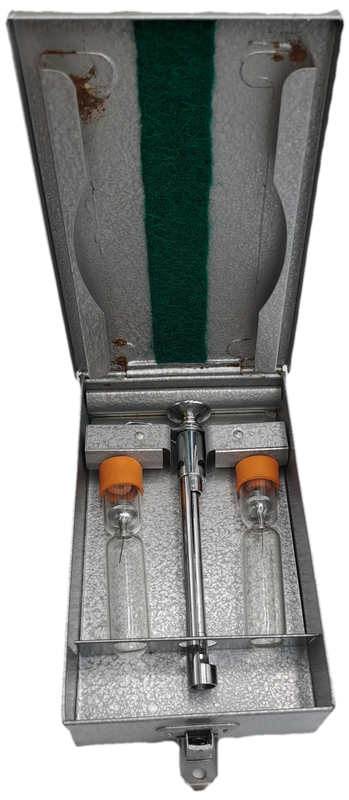 Boots viule syringe in a metal case with two glass containers with needles inside.