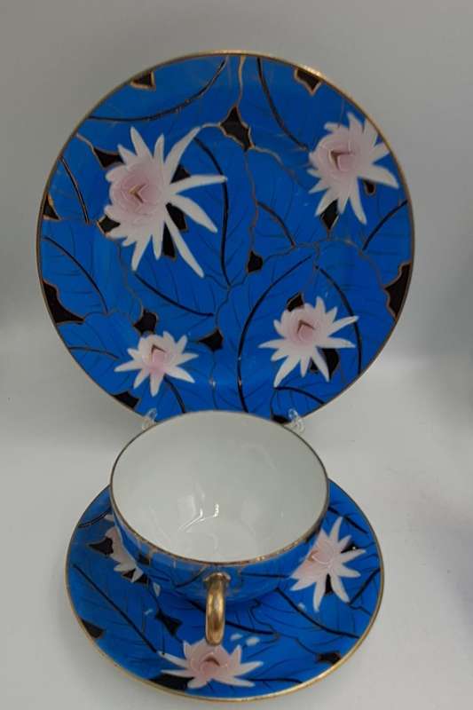 24pc Blue,White and Gold Bone China teaset one cup Missing -5 full trios