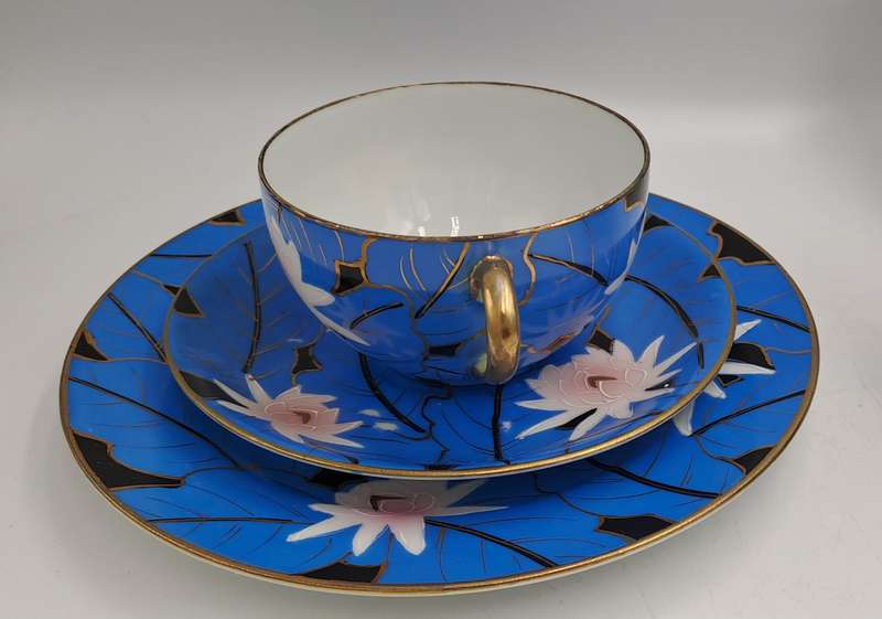 24pc Blue,White and Gold Bone China teaset one cup Missing -5 full trios