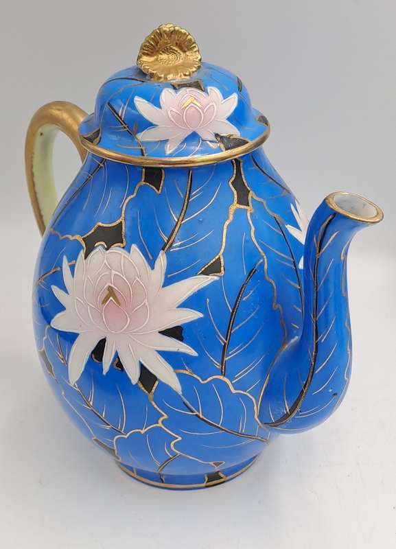 24pc Blue,White and Gold Bone China teaset one cup Missing -5 full trios