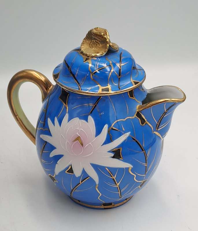 24pc Blue,White and Gold Bone China teaset one cup Missing -5 full trios