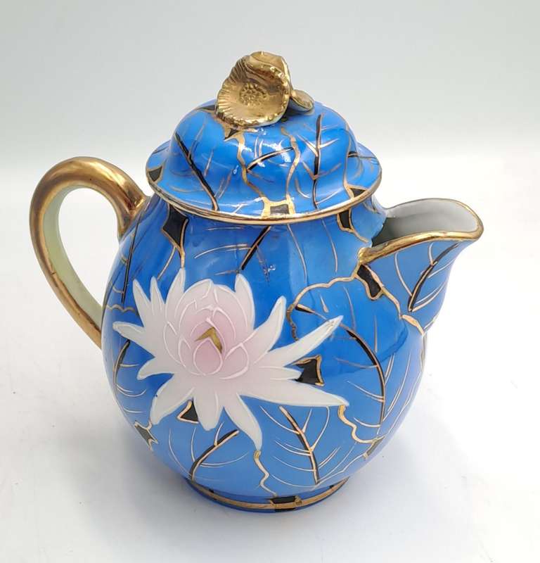 24pc Blue,White and Gold Bone China teaset one cup Missing -5 full trios