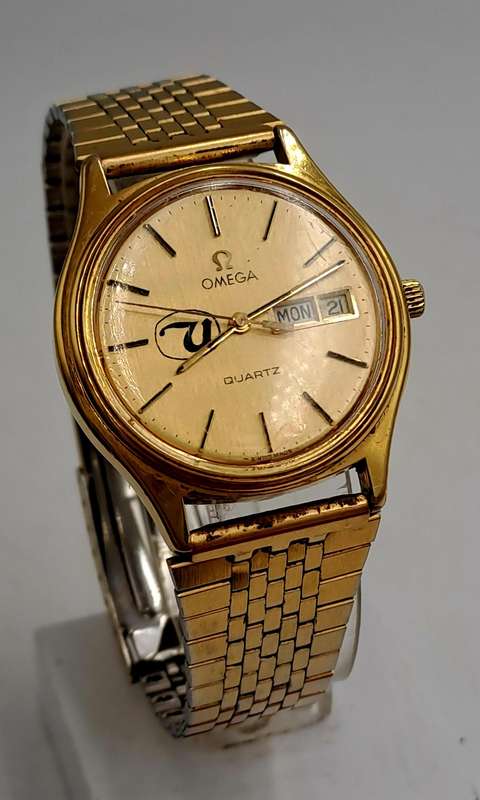 Vintage 1980's Omega quartz 1384 watch with United Logo -engraved -running but need repairs