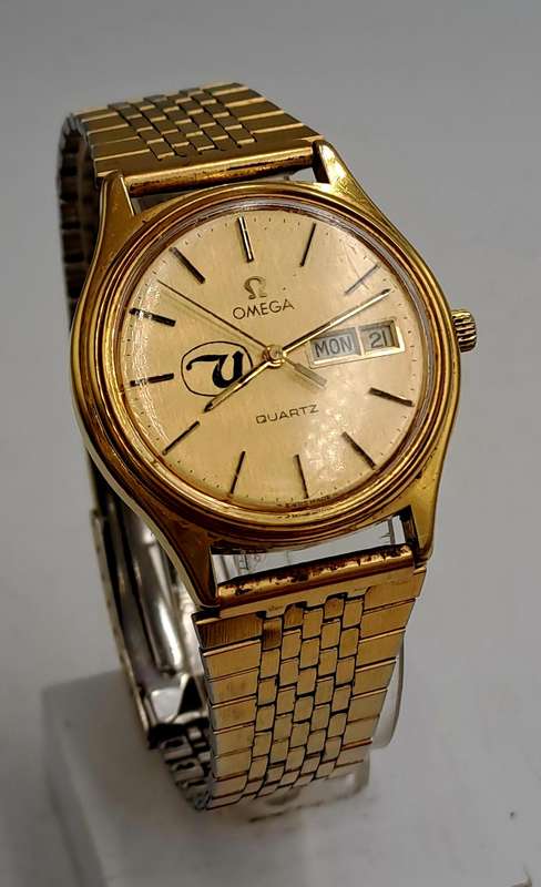 Vintage 1980's Omega quartz 1384 watch with United Logo -engraved -running but need repairs