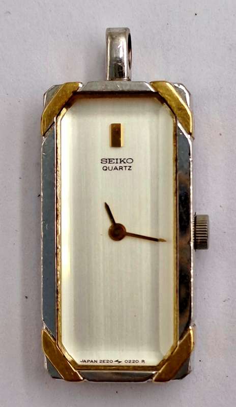 Pre-Owned Vintage 1984 SEIKO Quartz Pendant watch on silver Chain