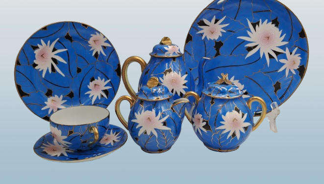 24pc Blue,White and Gold Bone China teaset one cup Missing -5 full trios