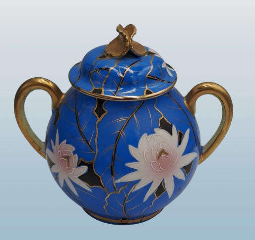 24pc Blue,White and Gold Bone China teaset one cup Missing -5 full trios