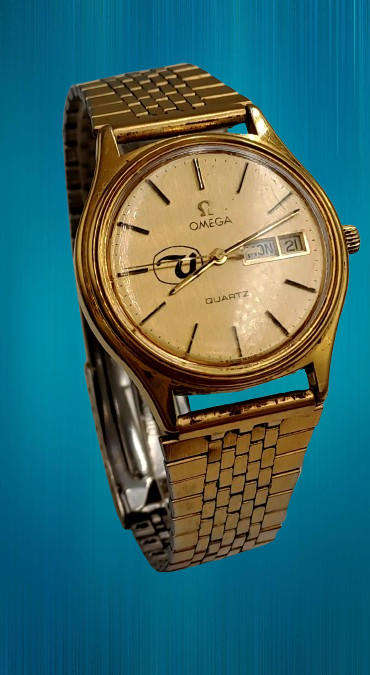 Vintage 1980's Omega quartz 1384 watch with United Logo -engraved -running but need repairs