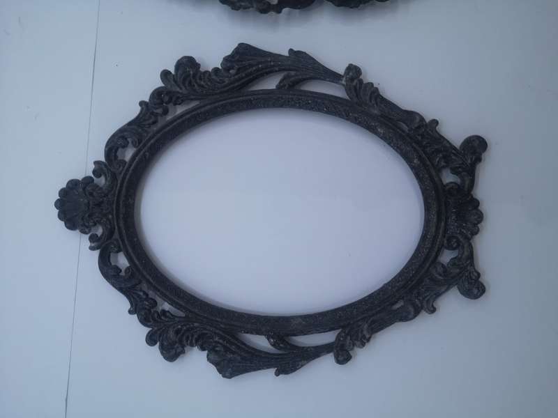 Brass frames painted black - no glass or backing