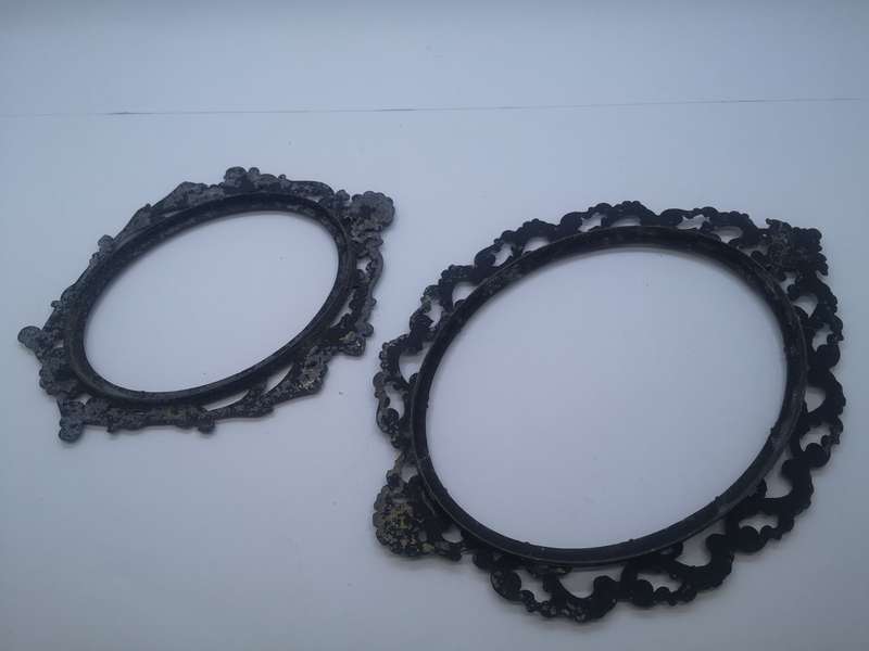 Brass frames painted black - no glass or backing