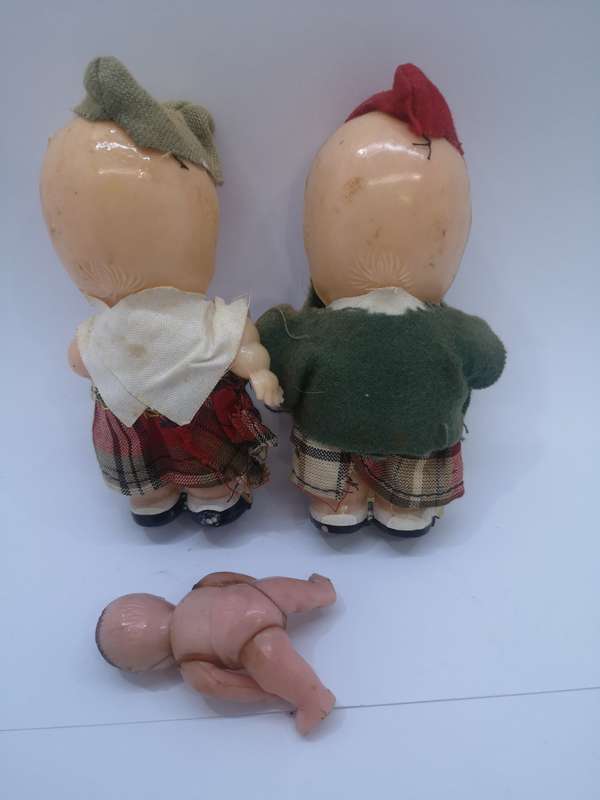Hard plastic Kewpie dolls with movable hands - small doll with moving hands and legs