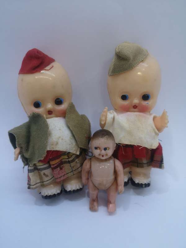 Hard plastic Kewpie dolls with movable hands - small doll with moving hands and legs