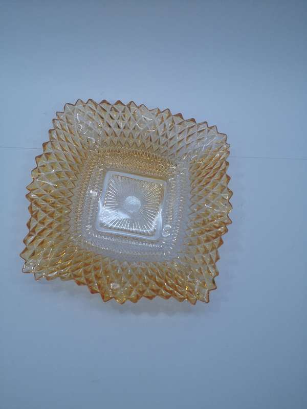 Colored pressed glass bowl