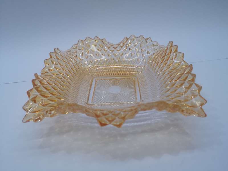 Colored pressed glass bowl