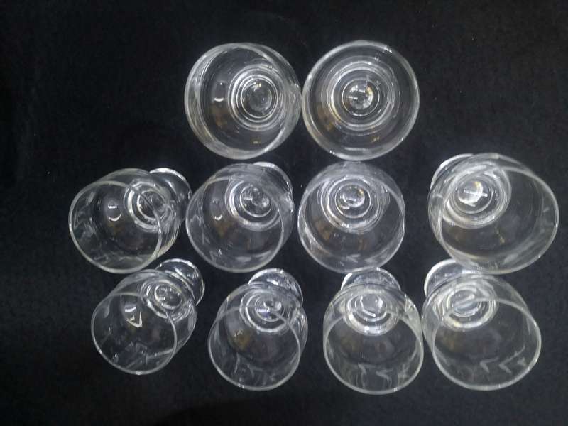 Set of ten cut glass sherry glasses