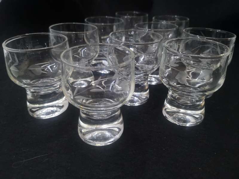 Set of ten cut glass sherry glasses