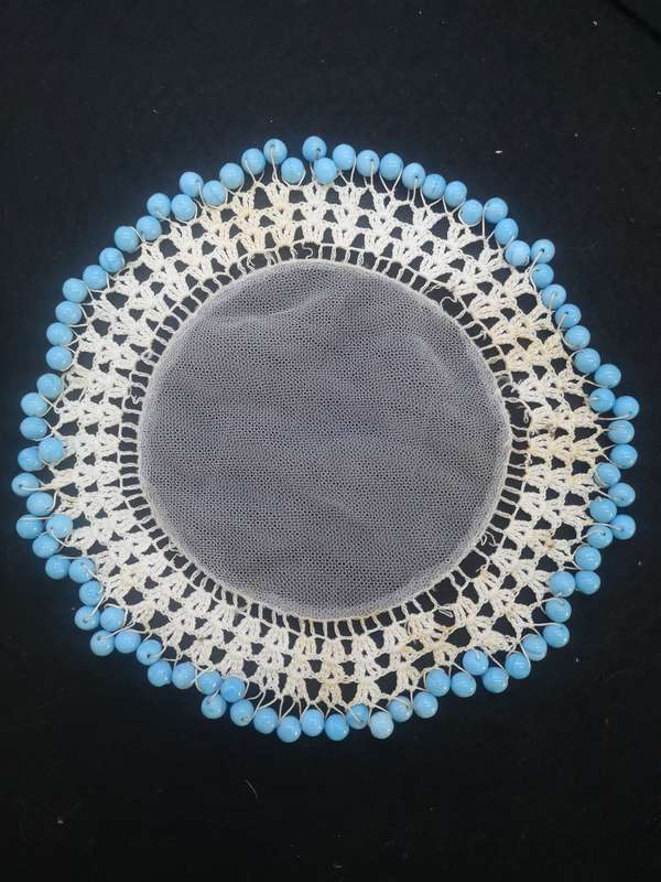 Blue glass bead doilie