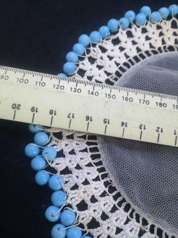 Blue glass bead doilie