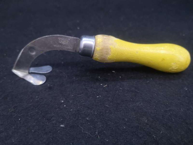Tala segmenter tool with yellow wooden handle