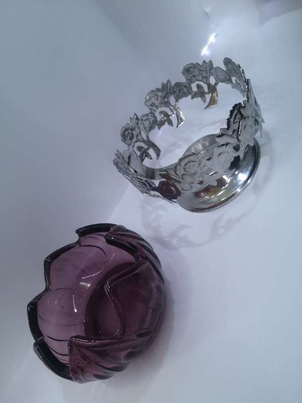 Purple glass liner in silver basket