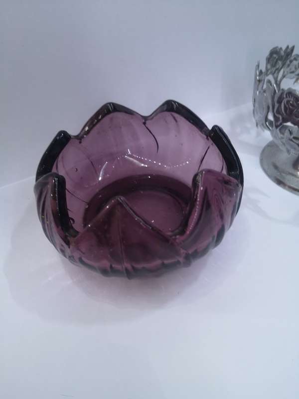 Purple glass liner in silver basket