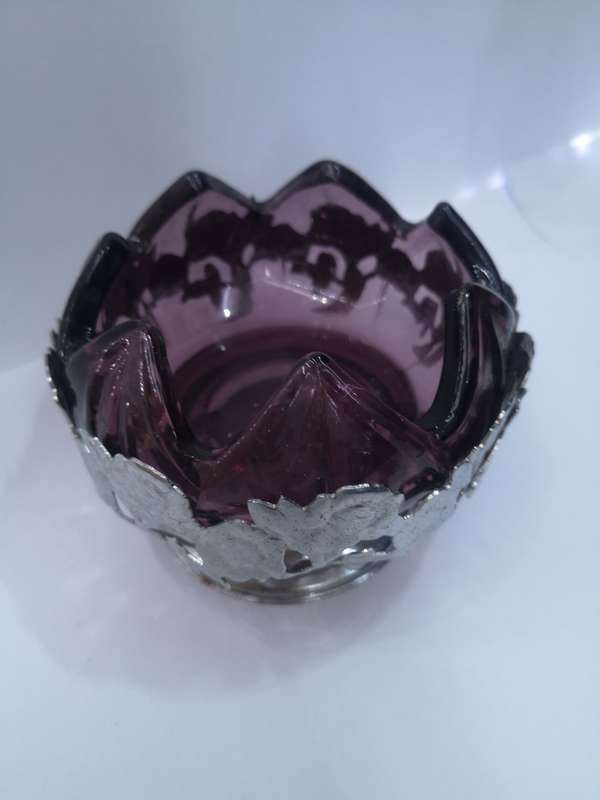 Purple glass liner in silver basket