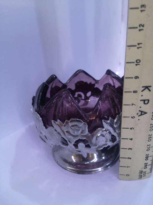 Purple glass liner in silver basket