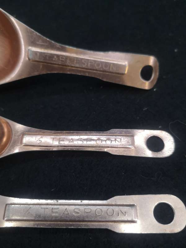 Copper measuring spoons