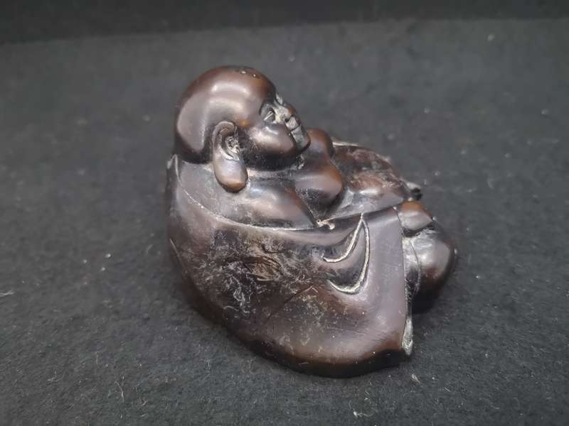 Buddha with Kama Sutra scene at the bottom