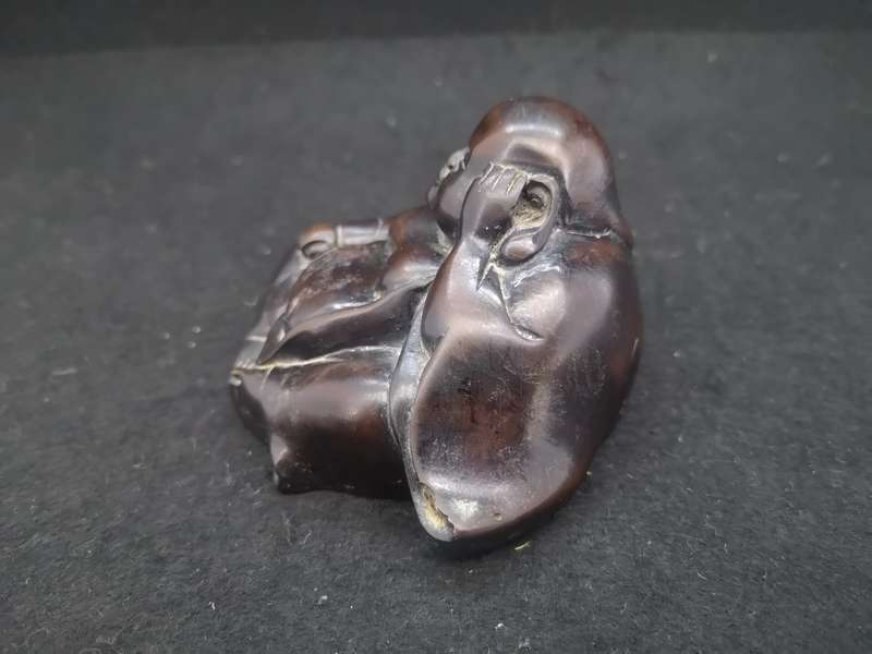 Buddha with Kama Sutra scene at the bottom