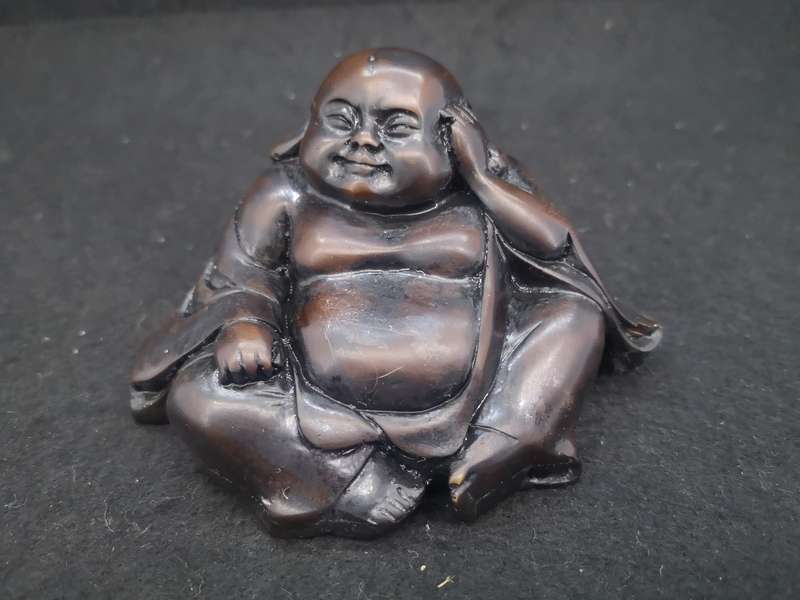 Buddha with Kama Sutra scene at the bottom