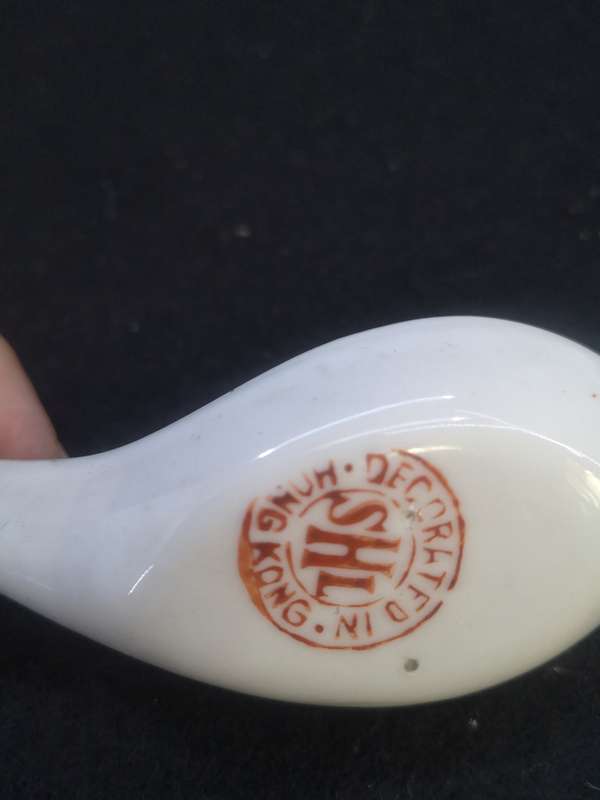 Chinese soup spoons - note small chip