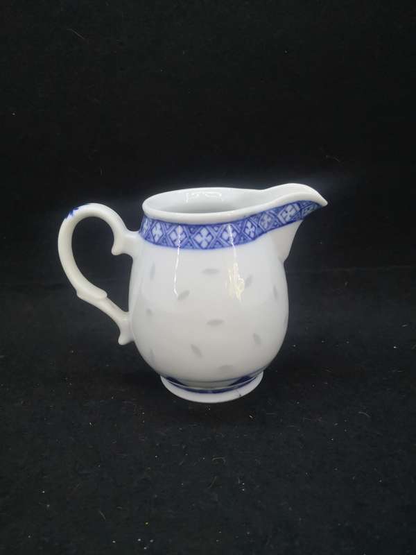 Milk jug Rice grain
