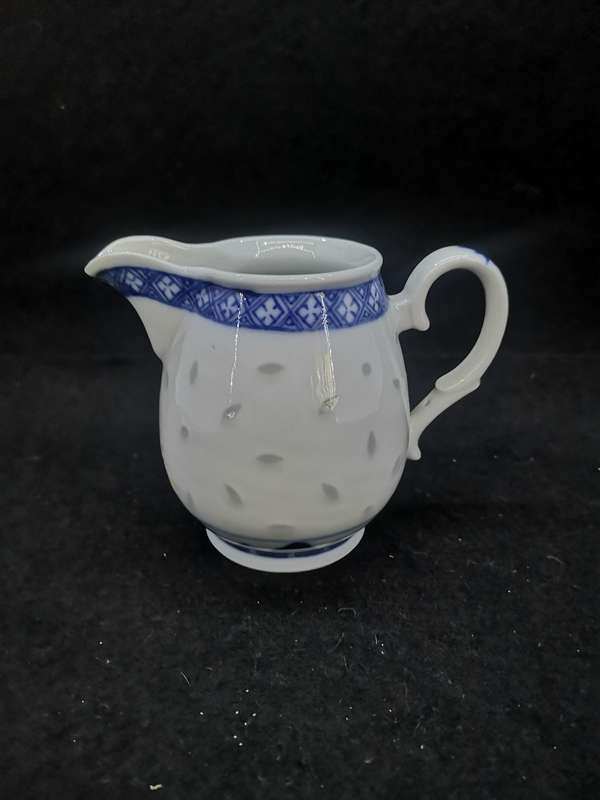 Milk jug Rice grain