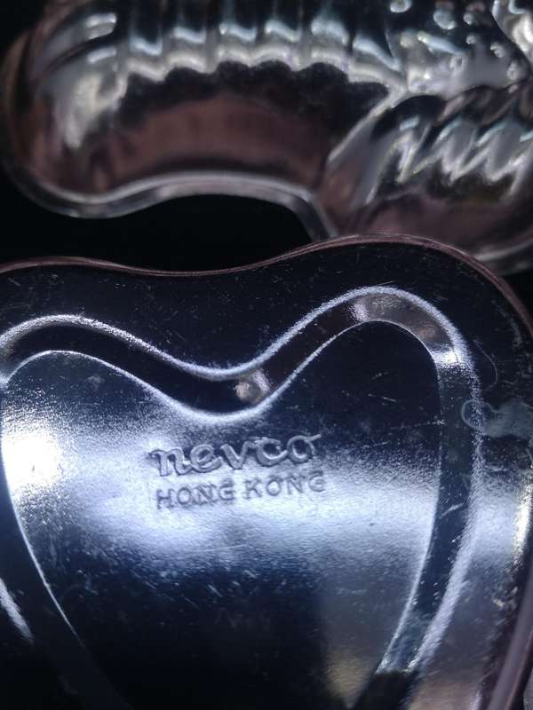 Vintage set of Nevco molds made in Hong Kong